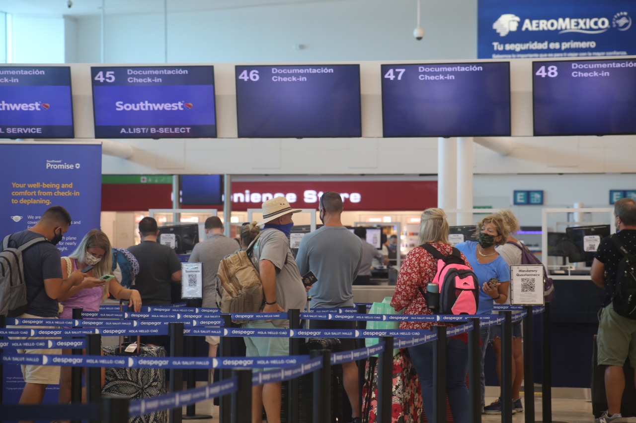 cancun airport high season