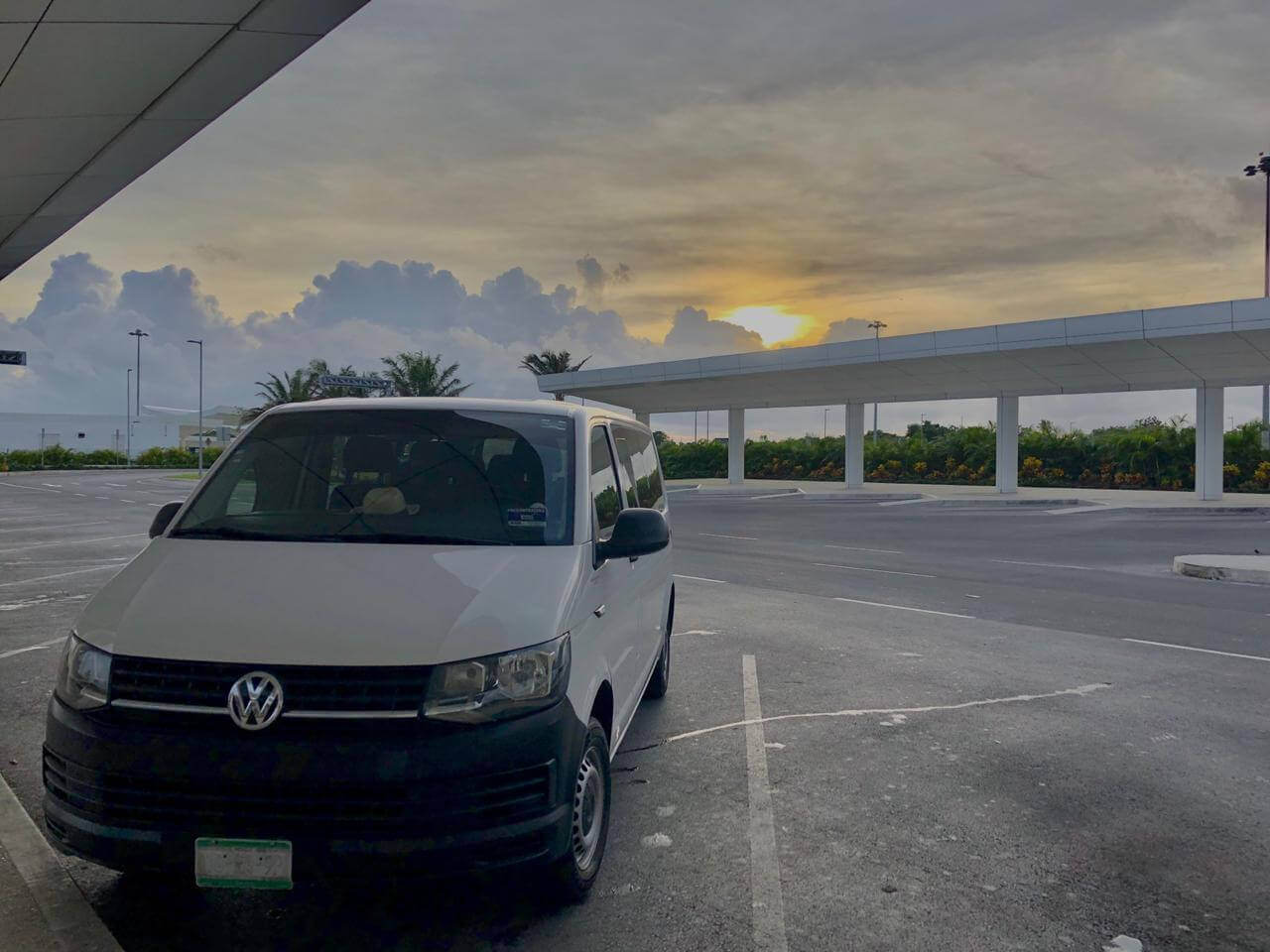 Private Transportation parked at Cancun Airport at sunset