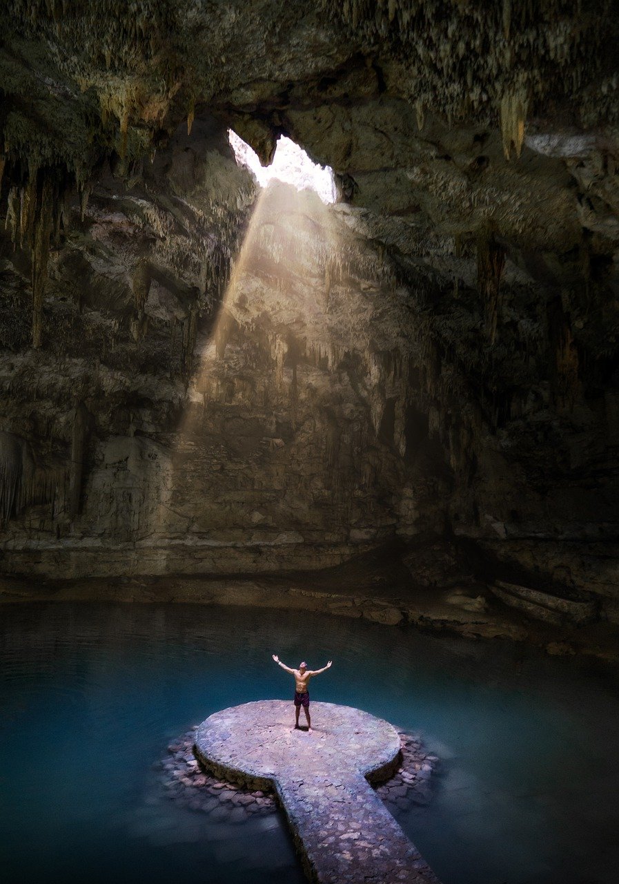 A man on a cenote adventure tour in Cancun