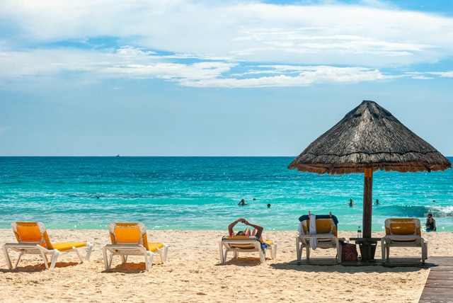 Beach beds next to the sea on a sunny day