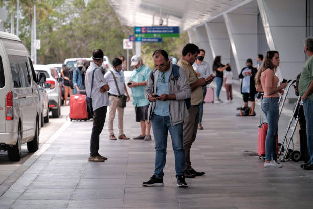 Cancun, Mexico, May 8, 2020.- Passengers and employees of the Cancun International Airport with mouth covers during the emergency by COVID-19.