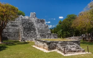 El Castillo, a towering pyramid that stands as a testament to the tradition, myth and craftsmanship of the Maya civilization at El Meco archeological site 